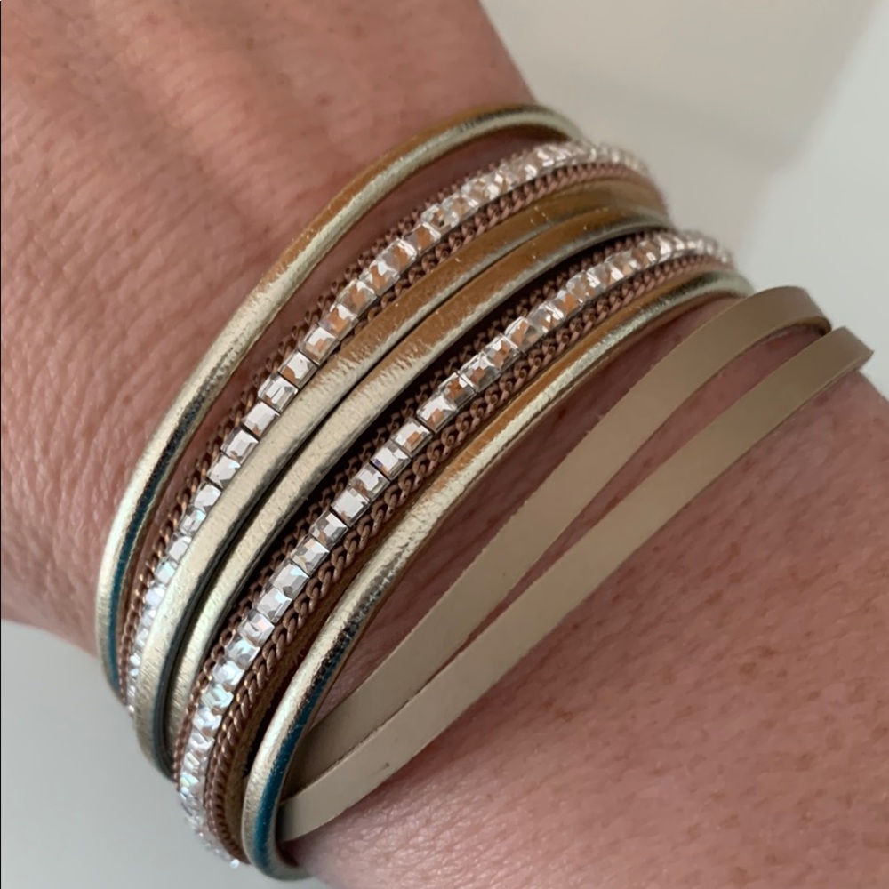 Elegant Gold and Silver Multi-Strand Bracelet